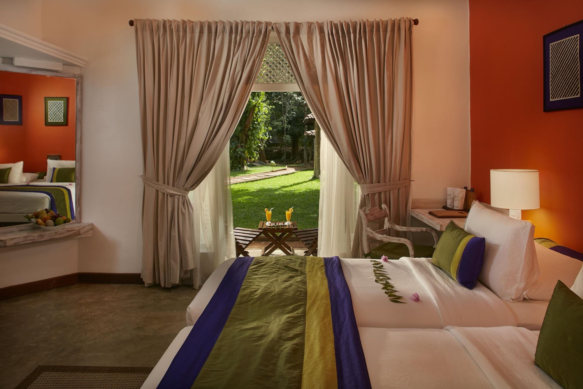 โรงแรมสิกิริยา ภายนอก รูปภาพ A room at the resort