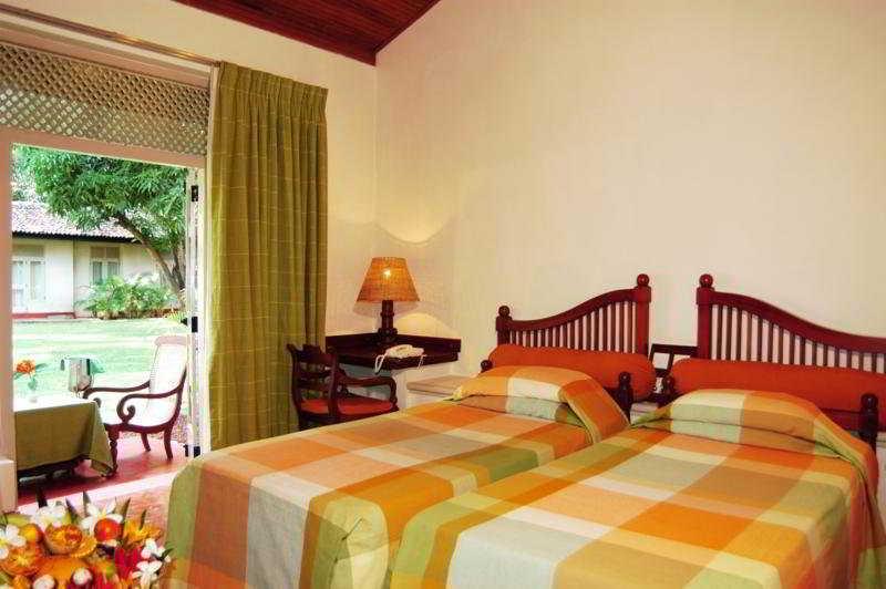 โรงแรมสิกิริยา ห้อง รูปภาพ A room at the hotel